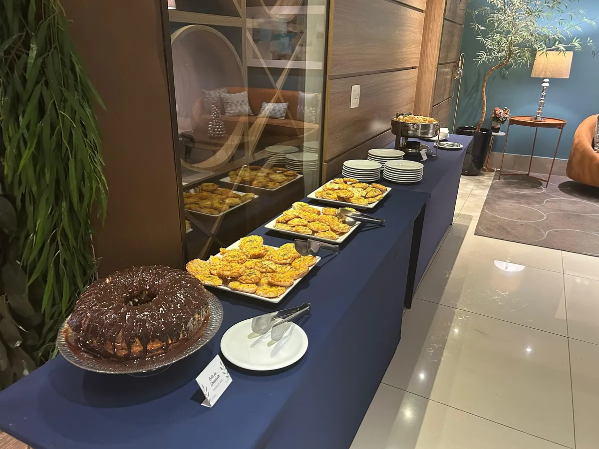 Coffee break table with cake and savory snacks at Hotel Heritage